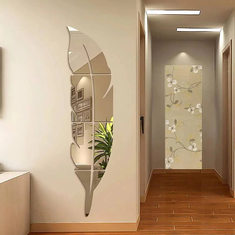 Decorative wall mirror shaped like a leaf in a hallway with floral wallpaper.