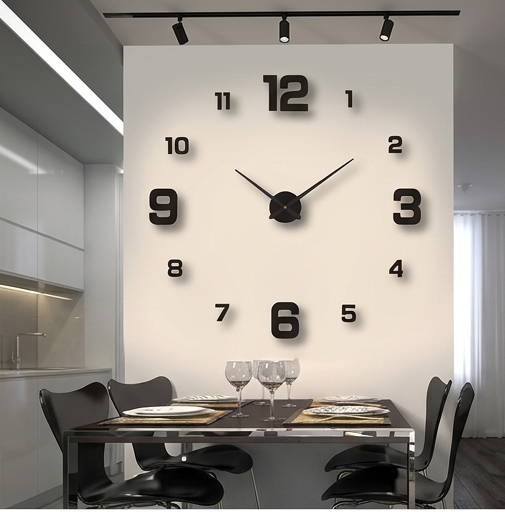 Dining room with a large wall clock featuring black numbers and modern decor.