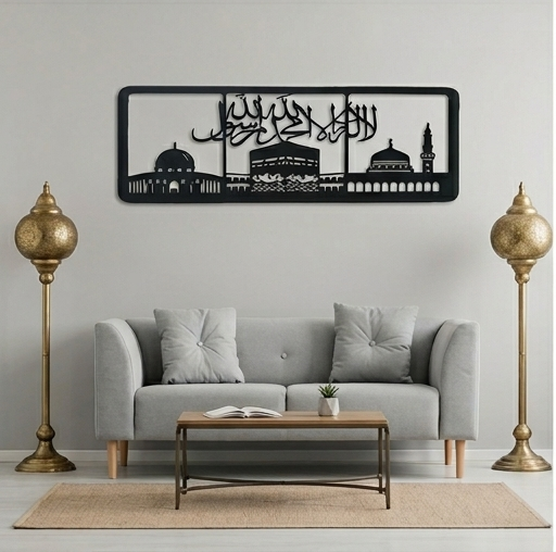 Decorative wall art with architectural design above a gray sofa in a living room.