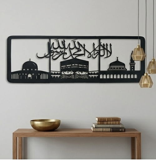 Decorative wall art with Islamic calligraphy and architectural elements on a plain wall.